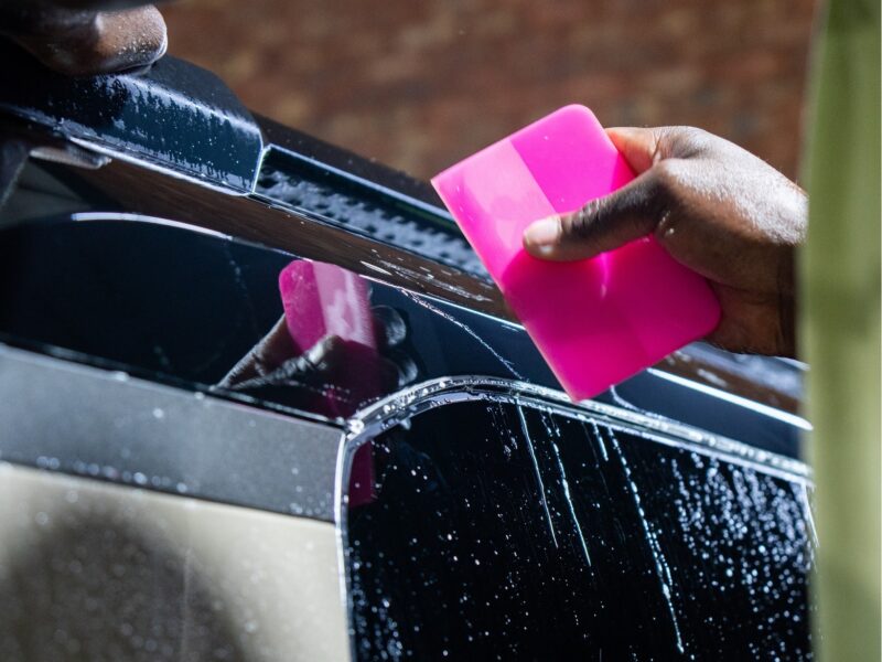 PPF being applied to a vehicle bonnet at Auto Vault, Brooklyn Pretoria